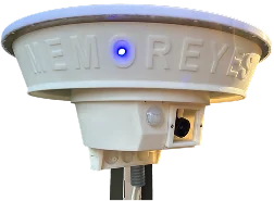 Memoreyes Municipal A white, round, and flat object with a small blue light in the center